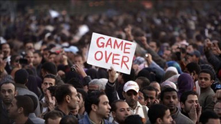 Illustration for article titled Two Words Helping Overthrow A Government